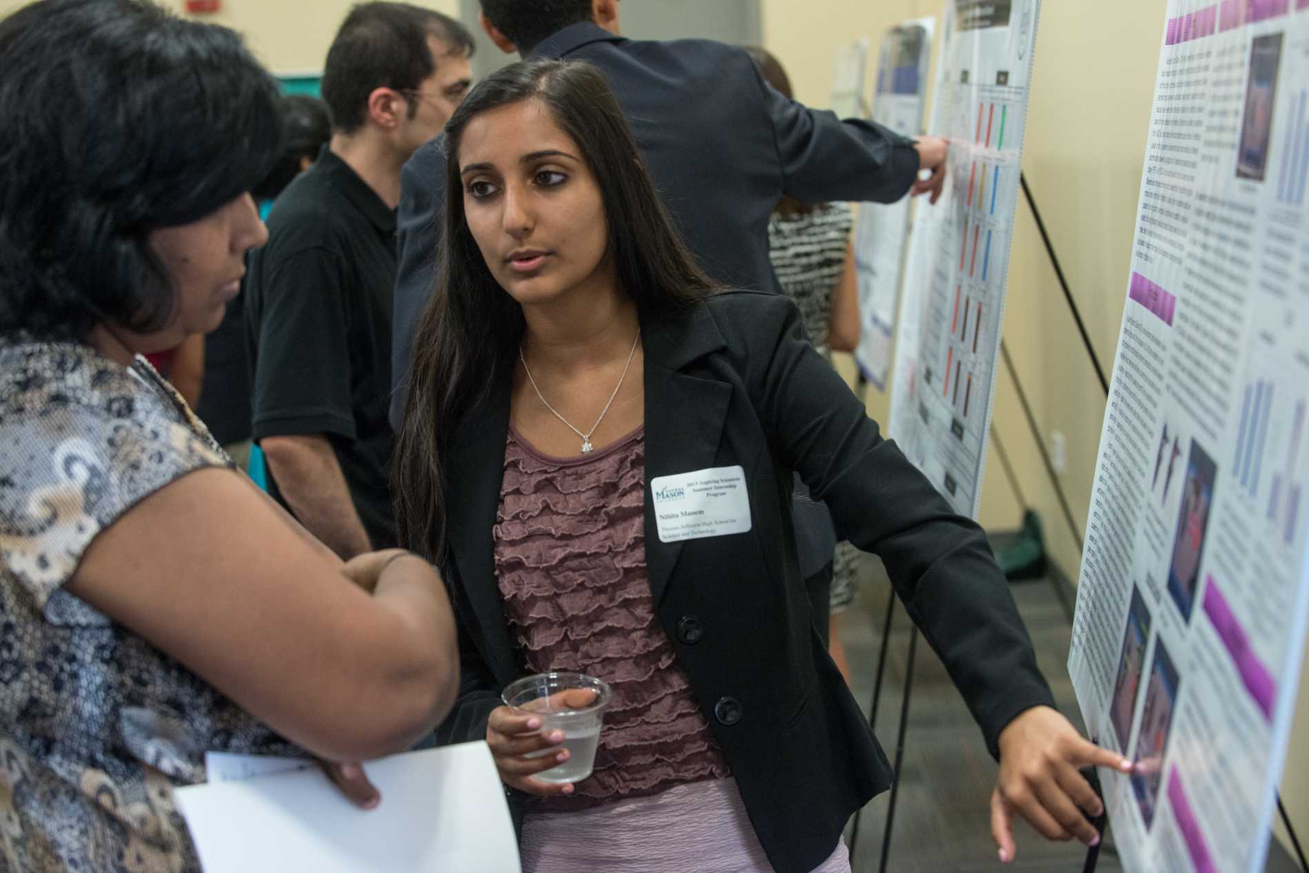 Photo of two students speaking