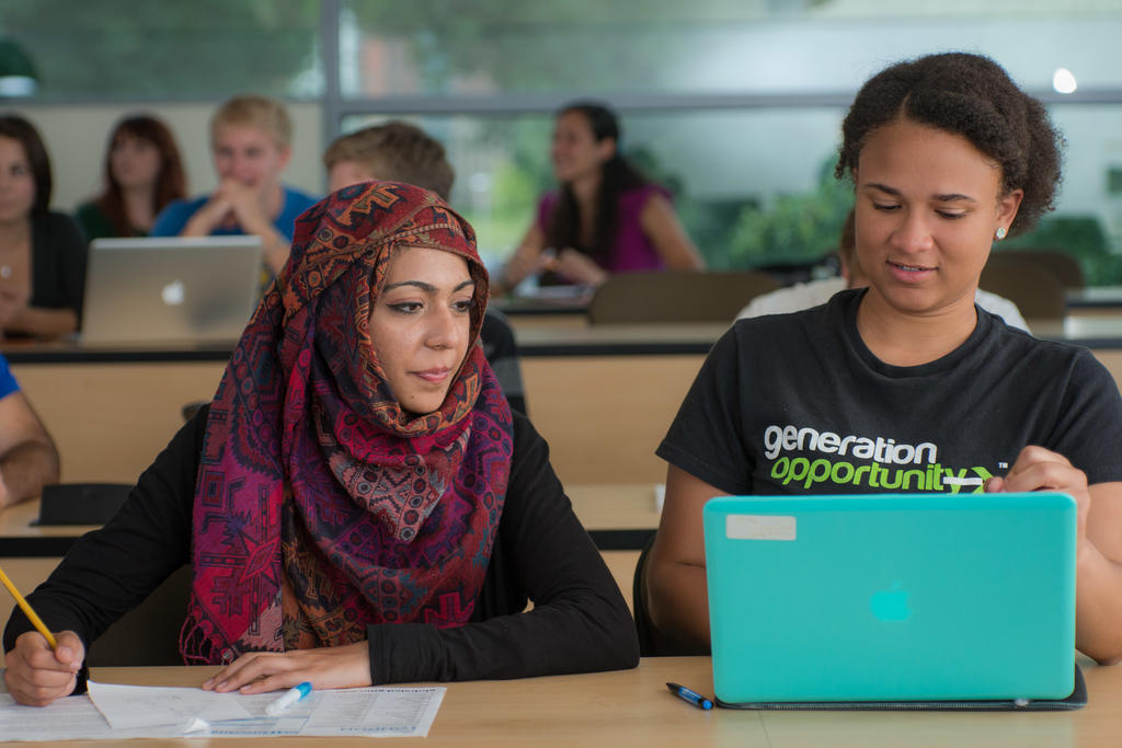 George Mason University students doing work in the classroom