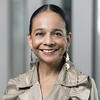 Guadalupe Correa-Cabrera wearing a beige blazer and smiling.